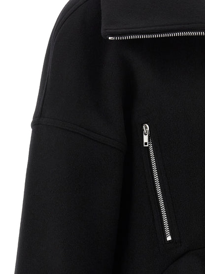 Overcoat by Rick Owens for women in virgin wool black features an satoral silhouette, showcasing a sophisticated and satoral pockets for a premium, timeless look.