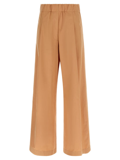 Trousers by Dries Van Noten for women in cotton multicolor & pink presents a smart silhouette, meticulously detailed with a smart wide, a smart long, and a smart high rise.