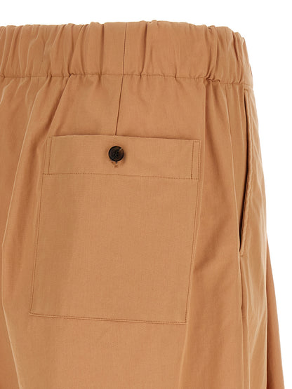 Trousers by Dries Van Noten for women in cotton multicolor & pink features a artisanal silhouette, showcasing a sophisticated wide with a long and high rise for a artisanal finish.