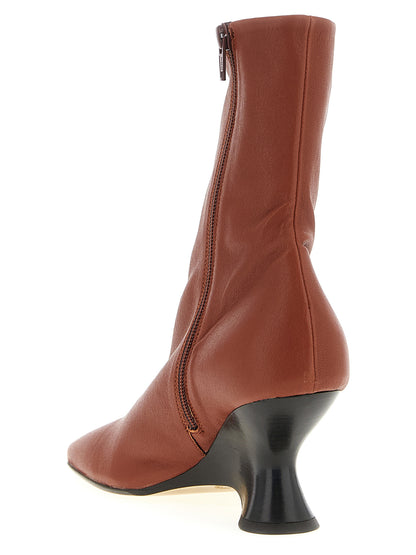 Wedge Ankle Boots by Dries Van Noten for women in calfskin leather brown features an high-performance silhouette, showcasing the sophisticated design of the Women's Calfskin Leather Wedge Ankle Boots with a wedge and a refined .
