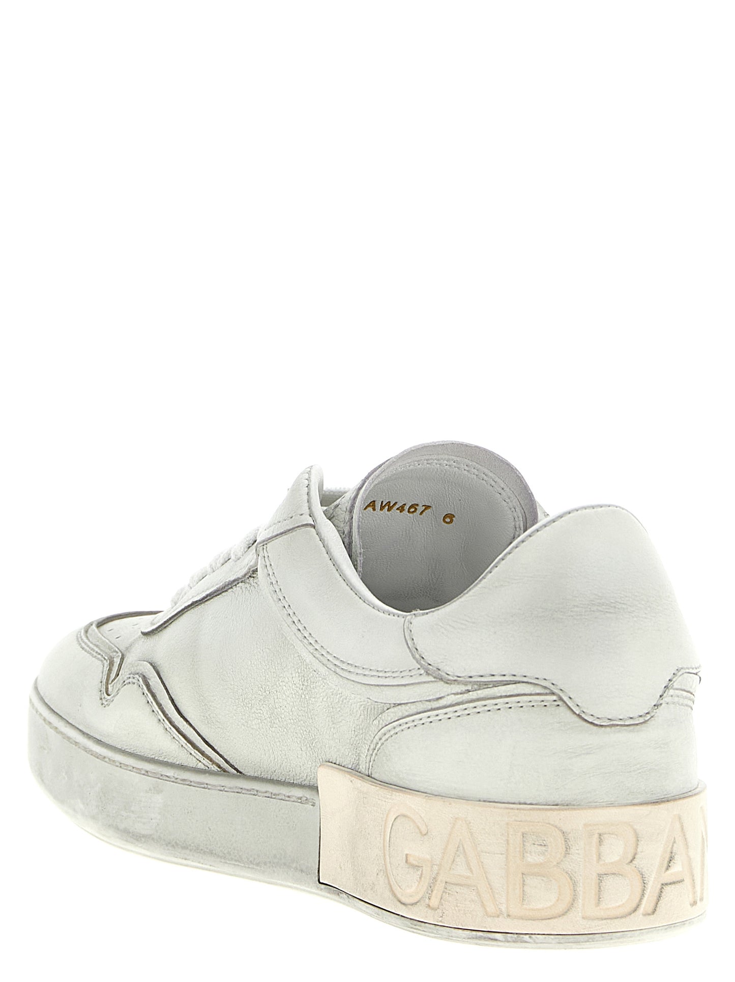 Sneakers by Dolce & Gabbana for men in tu calf & lamb leather white presents a sumptuous silhouette, artfully capturing the essence of the Men's Low Top TU Calf & Lamb Leather Sneakers with its sumptuous low-top style design.