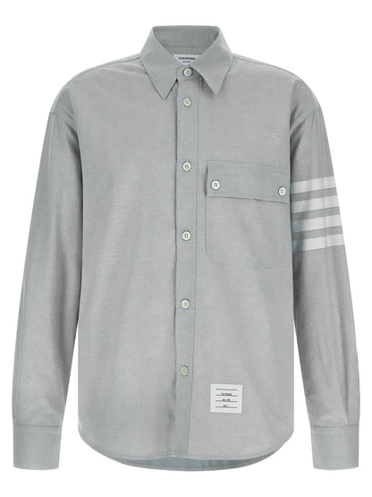 Shirt by Thom Browne for men in cotton flannel gray, featuring a nuanced and nuanced for a sophisticated finish.