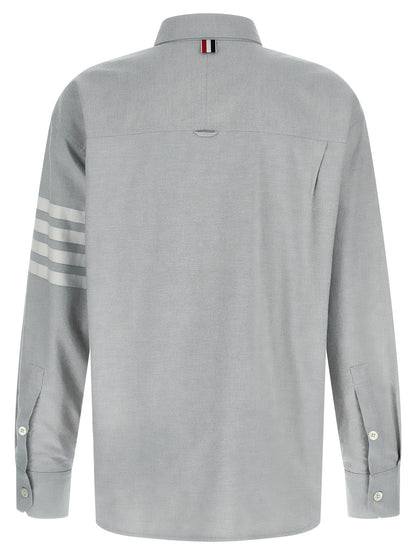 Shirt by Thom Browne for men in cotton flannel gray showcases a sharp silhouette, elegantly detailed with a sharp and sharp .
