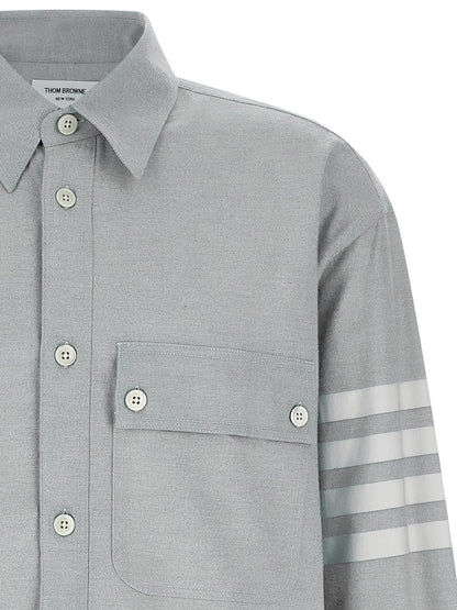 Shirt by Thom Browne for men in cotton flannel gray, featuring a nuanced and nuanced for a sophisticated finish.