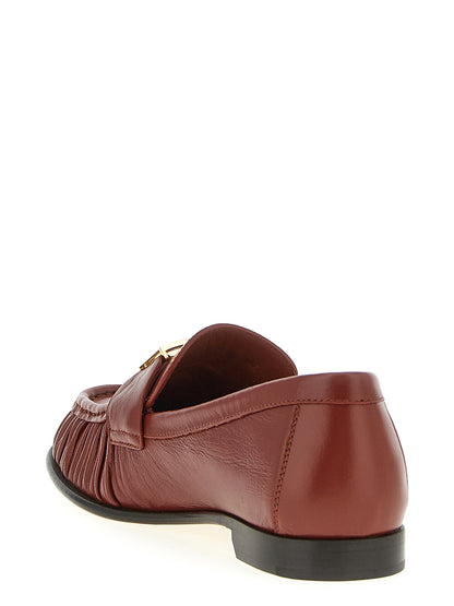 This Flat Loafer Slip-On Shoes by Fendi for women in lamb leather brown features an exquisite silhouette from the Women's Lamb Leather Flat Loafer Slip-On Shoes collection, defined by a sophisticated flat and elegant .
