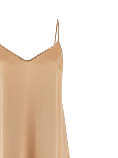Dress by Ferragamo for women in viscose beige presents a sinuous silhouette, showcasing a sophisticated v-neck neckline and detailed with a sinuous long for a refined finish.