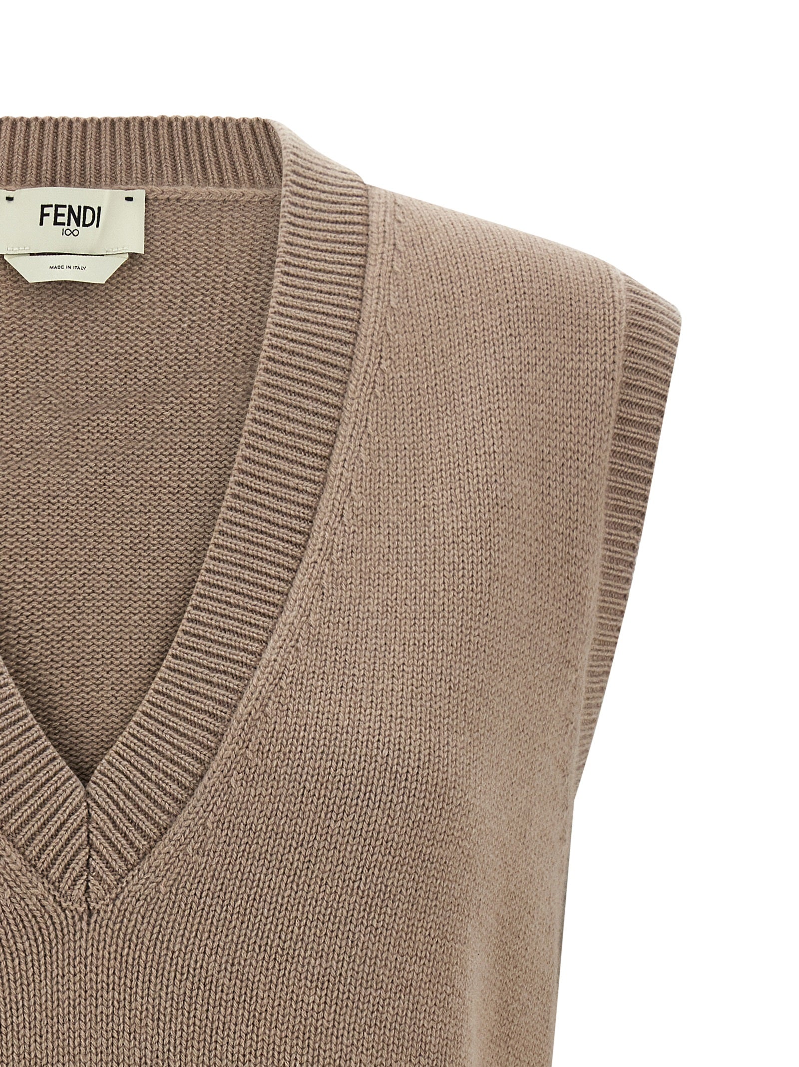 Vest by Fendi for women in cashmere beige showcases a utilitarian silhouette, artfully incorporating and a utilitarian v-neck neckline for a truly utilitarian finish.
