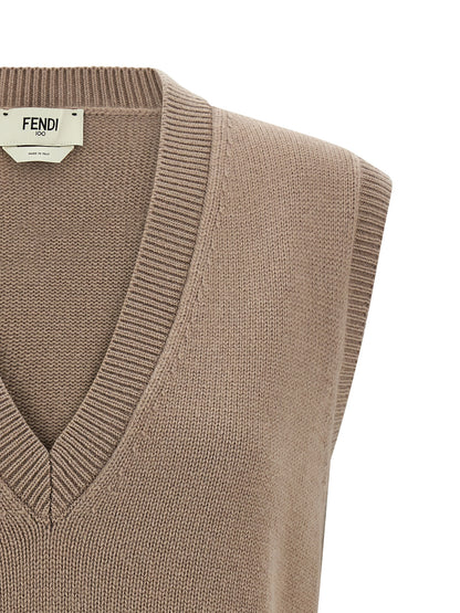 Vest by Fendi for women in cashmere beige showcases a utilitarian silhouette, artfully incorporating and a utilitarian v-neck neckline for a truly utilitarian finish.