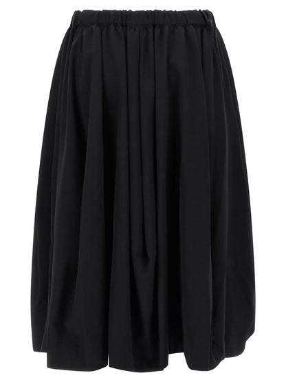 Skirt by Comme Des Garçons for women in wool black features an tailored silhouette, artfully capturing the essence of Women's Wool Maxi Mini Skirt in a sophisticated maxi mini.
