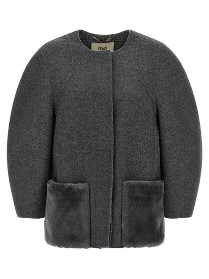 Overcoat by Fendi for women in plush silk virgin wool gray & patterned showcases a architectural silhouette, artfully detailed with a distinctive and functional pockets for a architectural finish.