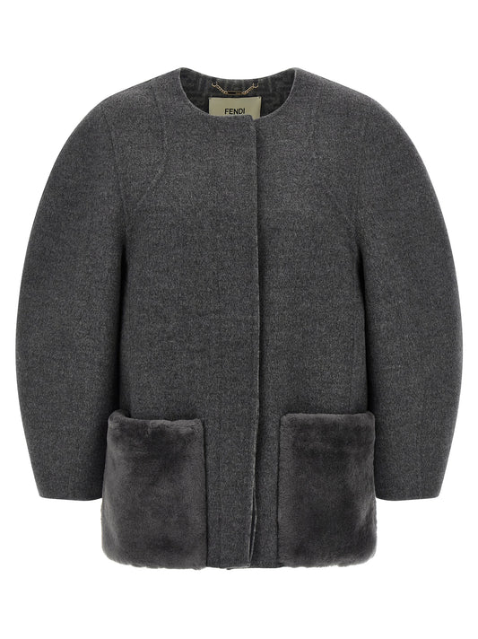 Overcoat by Fendi for women in plush silk virgin wool gray & patterned showcases a architectural silhouette, artfully detailed with a distinctive and functional pockets for a architectural finish.