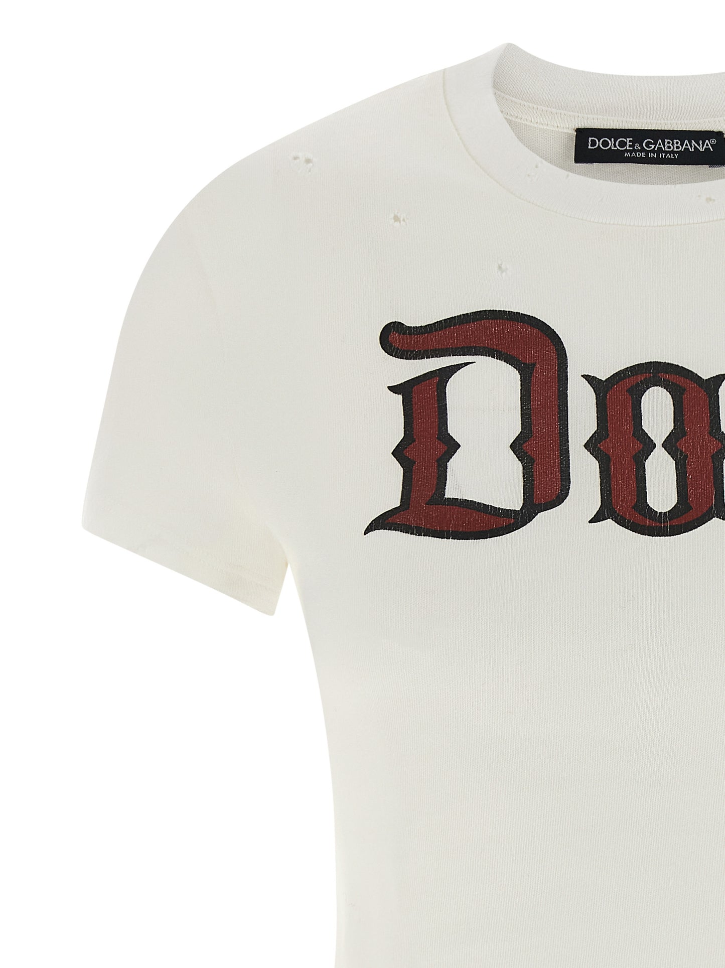 T-Shirt by Dolce & Gabbana for women in cotton white & print showcases a unassuming silhouette, artfully detailed with a refined crew neckline and unassuming for a sophisticated, contemporary look.