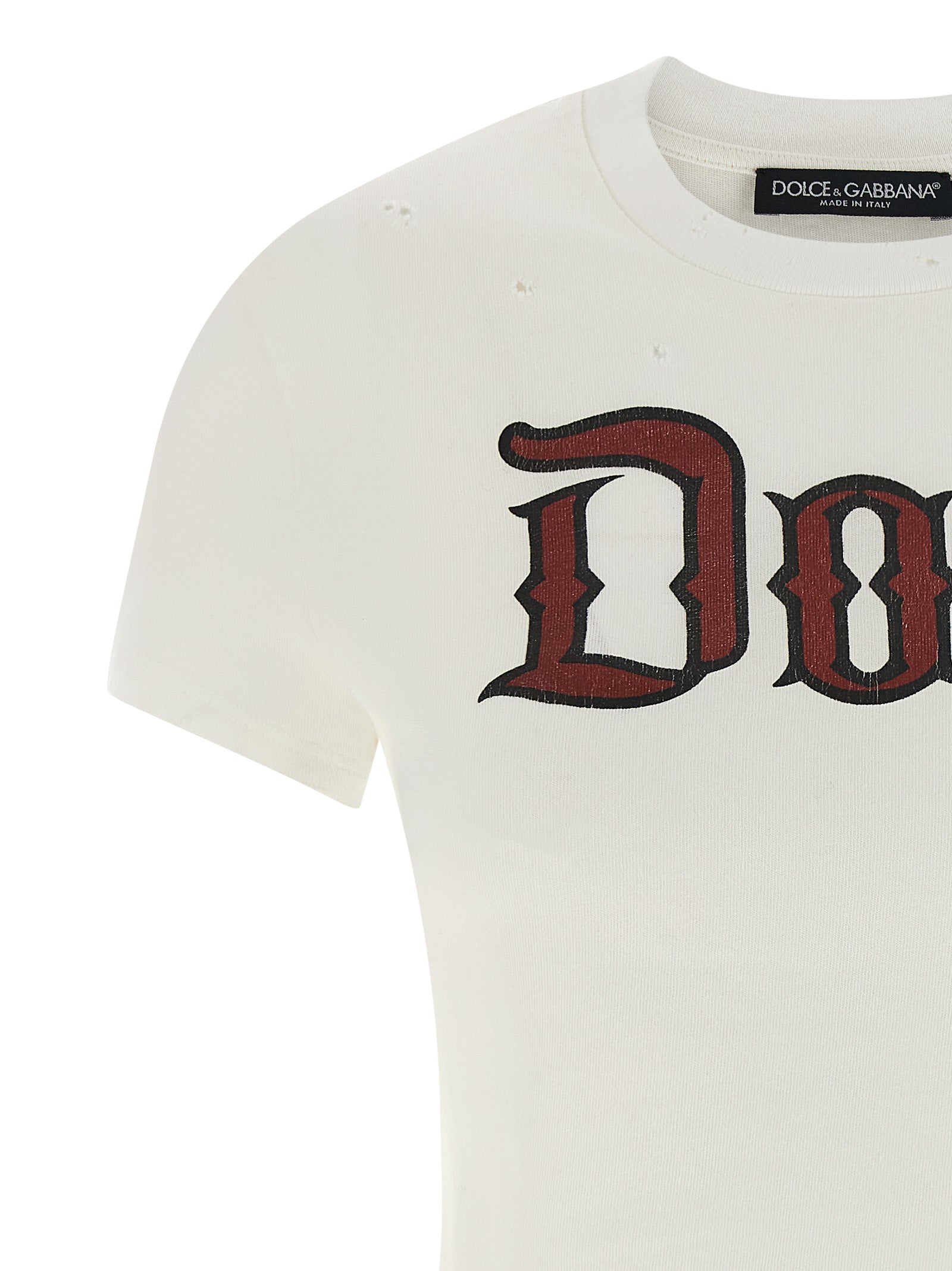 T-Shirt by Dolce & Gabbana for women in cotton white & print showcases a unassuming silhouette, artfully detailed with a refined crew neckline and unassuming for a sophisticated, contemporary look.
