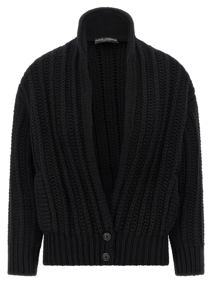 Cardigan by Dolce & Gabbana for women in virgin wool black features a nuanced silhouette with a refined shawl-collar neckline and nuanced detailing for a sophisticated look.