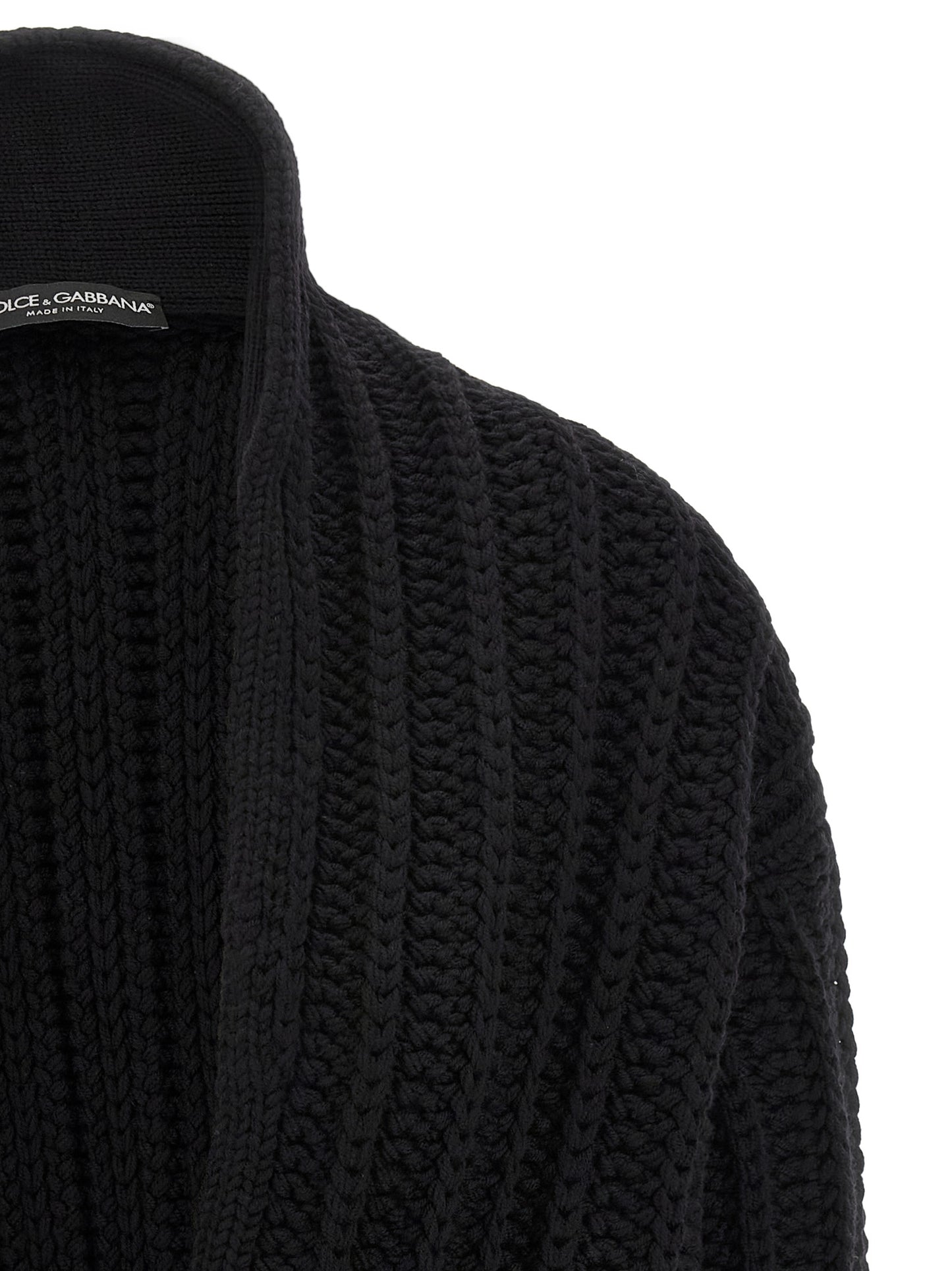 Cardigan by Dolce & Gabbana for women in virgin wool black showcases a luxurious silhouette, meticulously detailed with a sophisticated shawl-collar neckline and for a refined finish.
