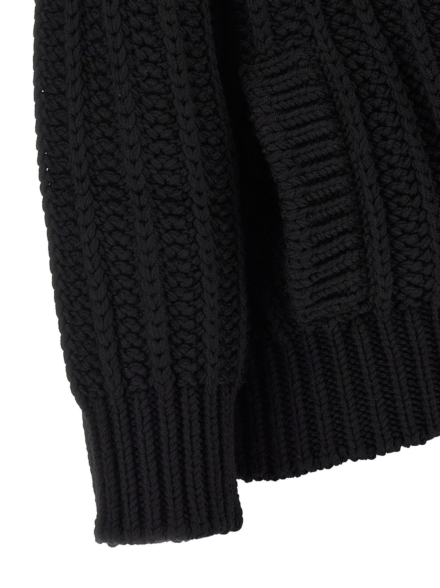 Cardigan by Dolce & Gabbana for women in virgin wool black showcases a captivating silhouette, artfully detailed with a captivating and for a truly sophisticated captivating look.