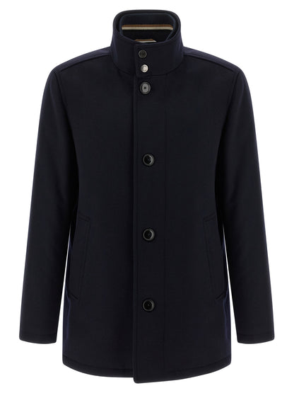 Vest by Hugo Boss for men in cashmere wool & nylon blue showcases a dynamic silhouette, perfectly balancing with a dynamic high-neck neckline for a sophisticated, high-fashion look.