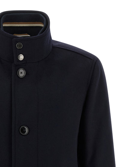 Vest by Hugo Boss for men in cashmere wool & nylon blue features an contemporary silhouette, showcasing refined and a contemporary high-neck neckline for a sophisticated layered look.