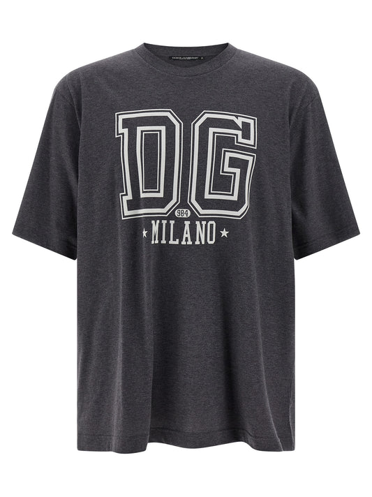 T-Shirt by Dolce & Gabbana for men in cotton gray & print showcases a dramatic silhouette, elegantly detailed with a dramatic crew neckline and short-sleeve for a truly dramatic finish.
