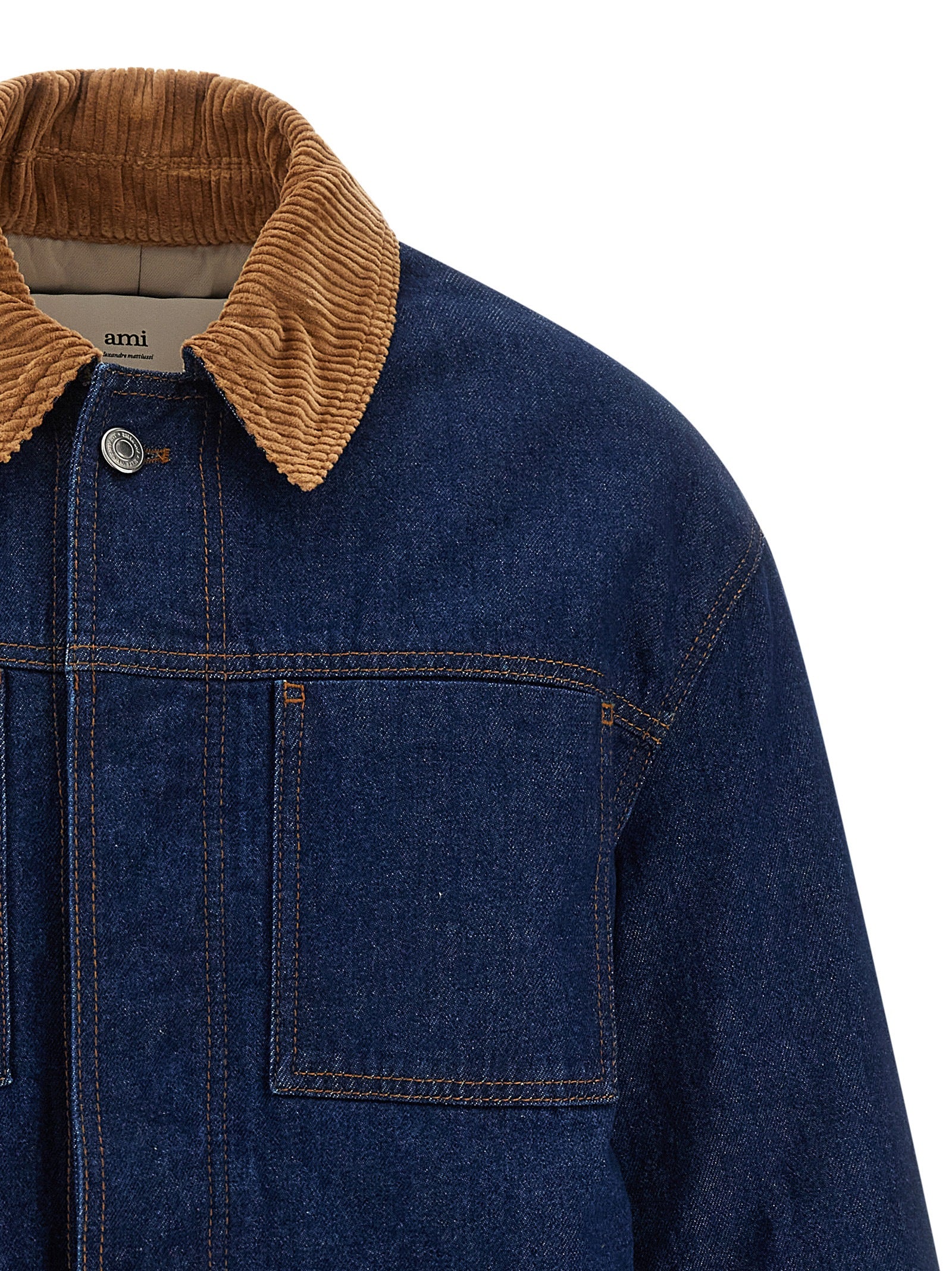 This Trucker Jacket by Ami Paris for men in denim cotton corduroy blue exhibits a edgy silhouette, meticulously detailed with functional pockets & insulated and a edgy shirt-collar neckline for a edgy finish.