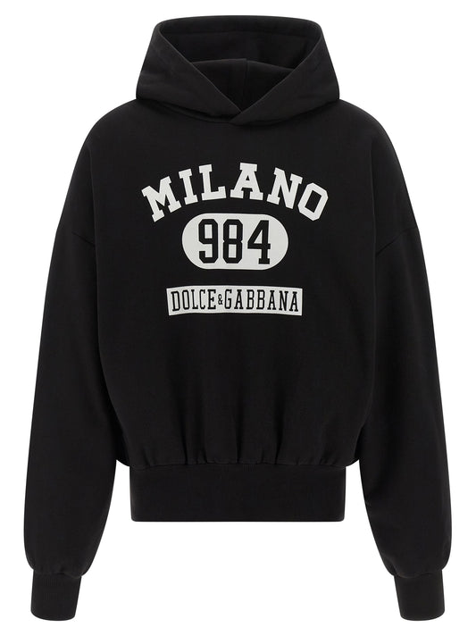 Sweatshirt Hoodie by Dolce & Gabbana for men in cotton bicolour, black, white & print features an luminous silhouette, showcasing a sophisticated hooded neckline and long-sleeve for a truly luminous look.
