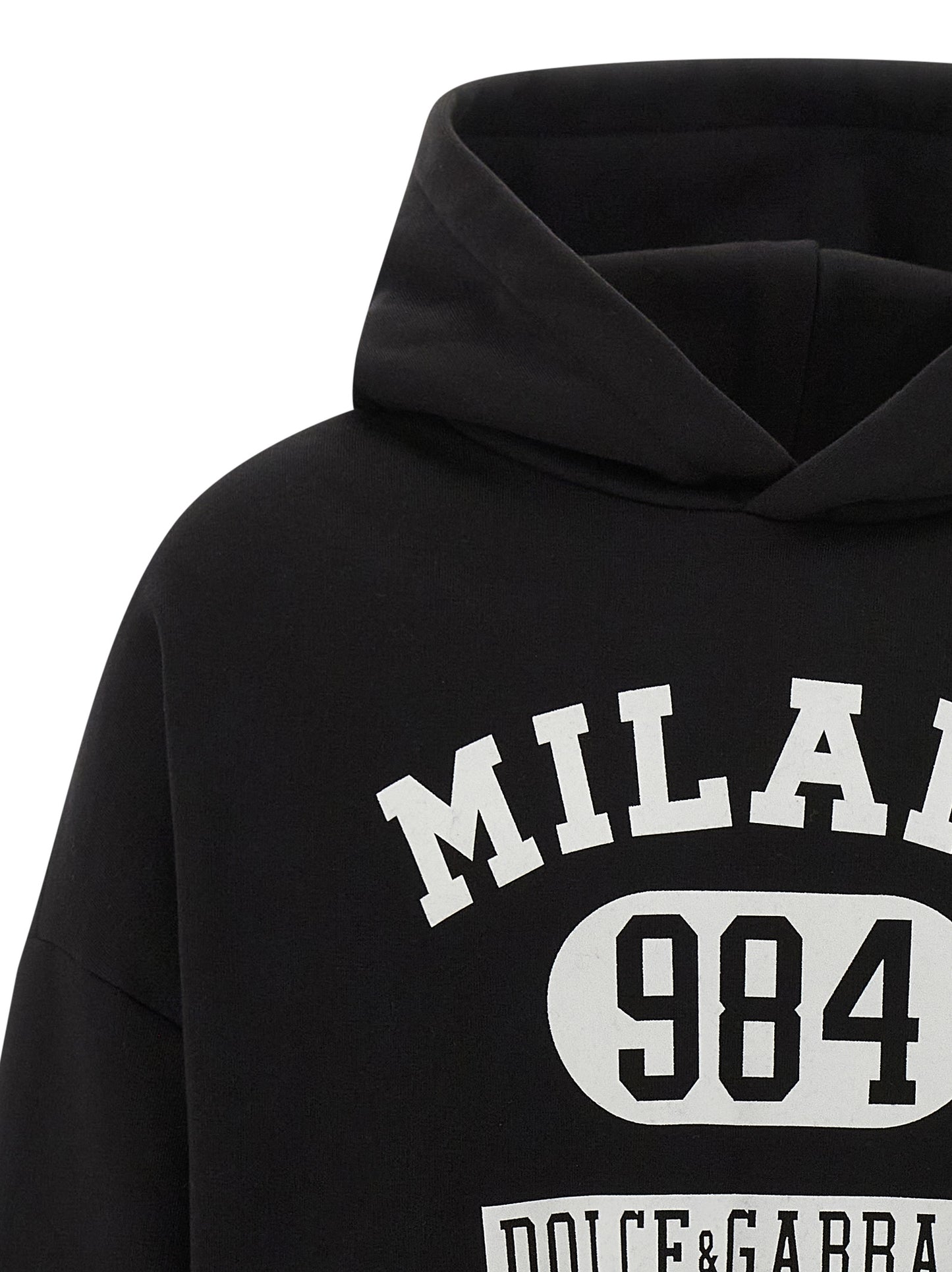 Sweatshirt Hoodie by Dolce & Gabbana for men in cotton bicolour, black, white & print features an dramatic silhouette, showcasing a sophisticated hooded neckline and dramatic for a refined, modern aesthetic.