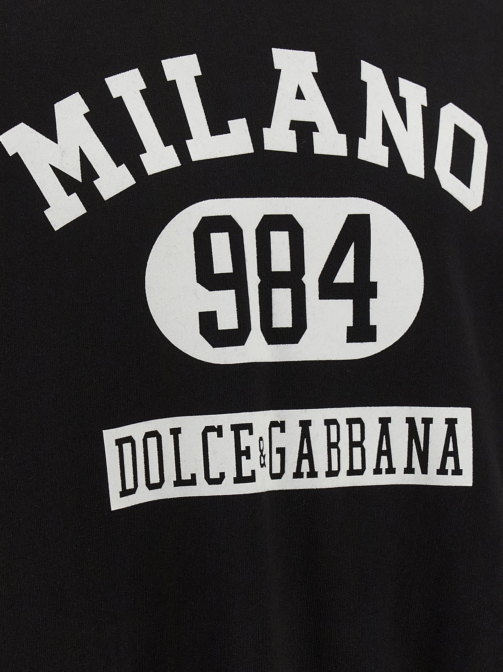 Sweatshirt Hoodie by Dolce & Gabbana for men in cotton bicolour, black, white & print features an avant-garde silhouette, showcasing a sophisticated hooded neckline and detail for a truly avant-garde finish.
