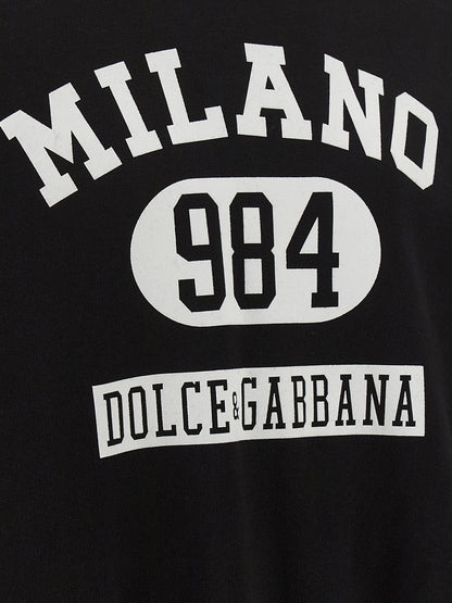 Sweatshirt Hoodie by Dolce & Gabbana for men in cotton bicolour, black, white & print features an avant-garde silhouette, showcasing a sophisticated hooded neckline and detail for a truly avant-garde finish.