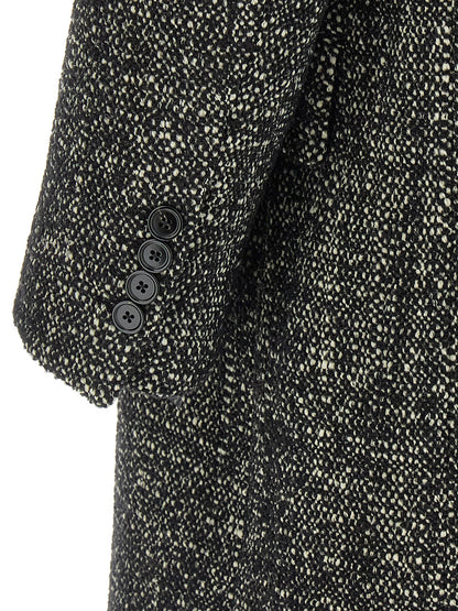 Trench Coat by Dolce & Gabbana for men in cashmere viscose bicolour, black & white features an dramatic silhouette, perfectly showcasing the elegant and sophisticated pockets for a truly dramatic aesthetic.