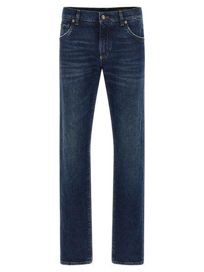 Jeans by Dolce & Gabbana for men in denim cotton blue presents a refined pantology silhouette, artfully defined by a refined pantology straight-leg, long, and a sophisticated low rise.