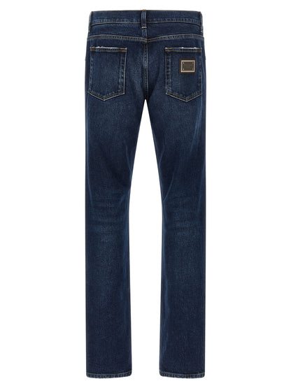 Jeans by Dolce & Gabbana for men in denim cotton blue features an refined tailoring silhouette, showcasing a premium straight-leg with a low rise and long cut for a refined tailoring look.