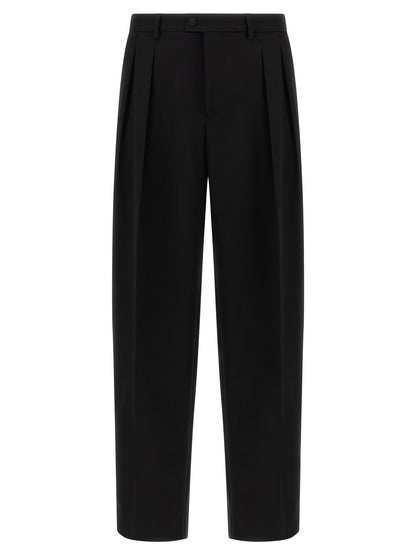 Trousers by Dolce & Gabbana for men in virgin wool black features a tailored silhouette with a tailored straight-leg & wide, defined by its long and a sophisticated .