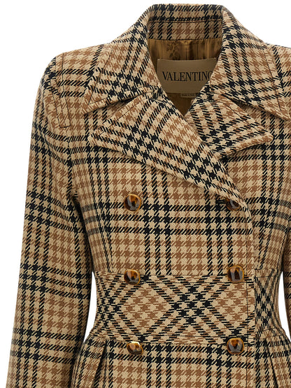 Overcoat by Valentino Garavani for women in virgin wool & cupro brown & monogram features an voluminous silhouette, showcasing distinct pockets & insulated and a voluminous split lapel neckline for a truly voluminous aesthetic.