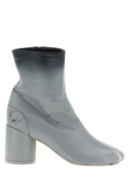 Ankle Boots by MM6 Maison Margiela for women in lambskin leather gray & white features an avant-garde Women's Lambskin Leather Ankle Boots silhouette, defined by a sophisticated and a avant-garde .
