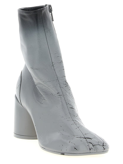 Ankle Boots by MM6 Maison Margiela for women in lambskin leather gray & white showcases a ergonomic silhouette from the Women's Lambskin Leather Ankle Boots collection, featuring a ergonomic and a ergonomic .