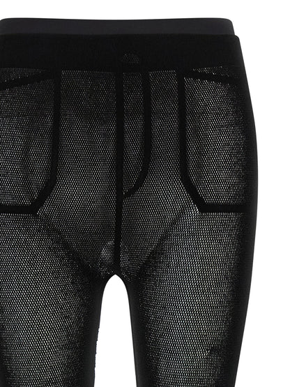 Activewear Leggings by Issey Miyake for women in polyurethane & nylon black & copper features an ergonomic leggings with mesh-panels, highlighting a ergonomic and long for a premium, high-performance look.