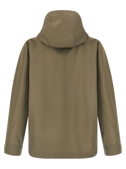 Hooded Windbreaker Jacket by Undercover for men in nylon bicolour, green & print features an stylish silhouette, showcasing a sophisticated hooded high-neck neckline and performance-driven pockets, hooded & windproof for a premium, stylish look.