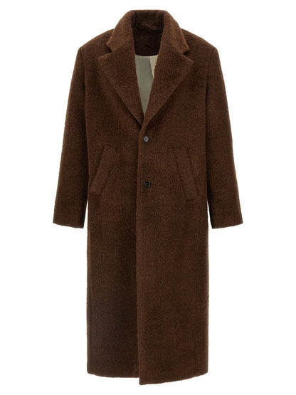 Overcoat by SÉFR for men in viscose mohair & alpaca wool brown & horn features an voluminous silhouette, showcasing distinct pockets & insulated and a voluminous split lapel neckline for a truly voluminous aesthetic.