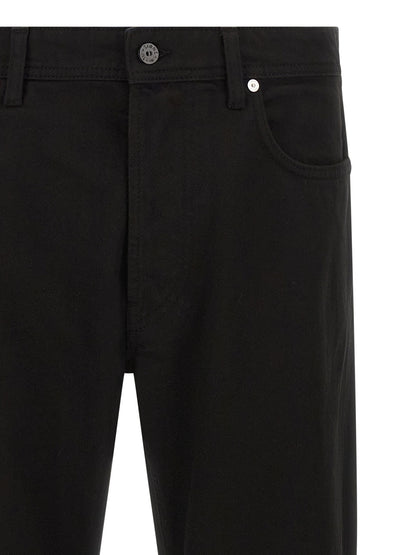 Jeans by Stone Island for men in denim cotton black & signature features a polished silhouette with a polished straight-leg, reaching a polished long and finished with a polished .