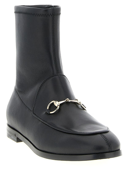 Ankle Boots by Gucci for women in lamb leather black features an avant-garde Women's Lamb Leather Ankle Boots silhouette, defined by a sophisticated and a avant-garde .