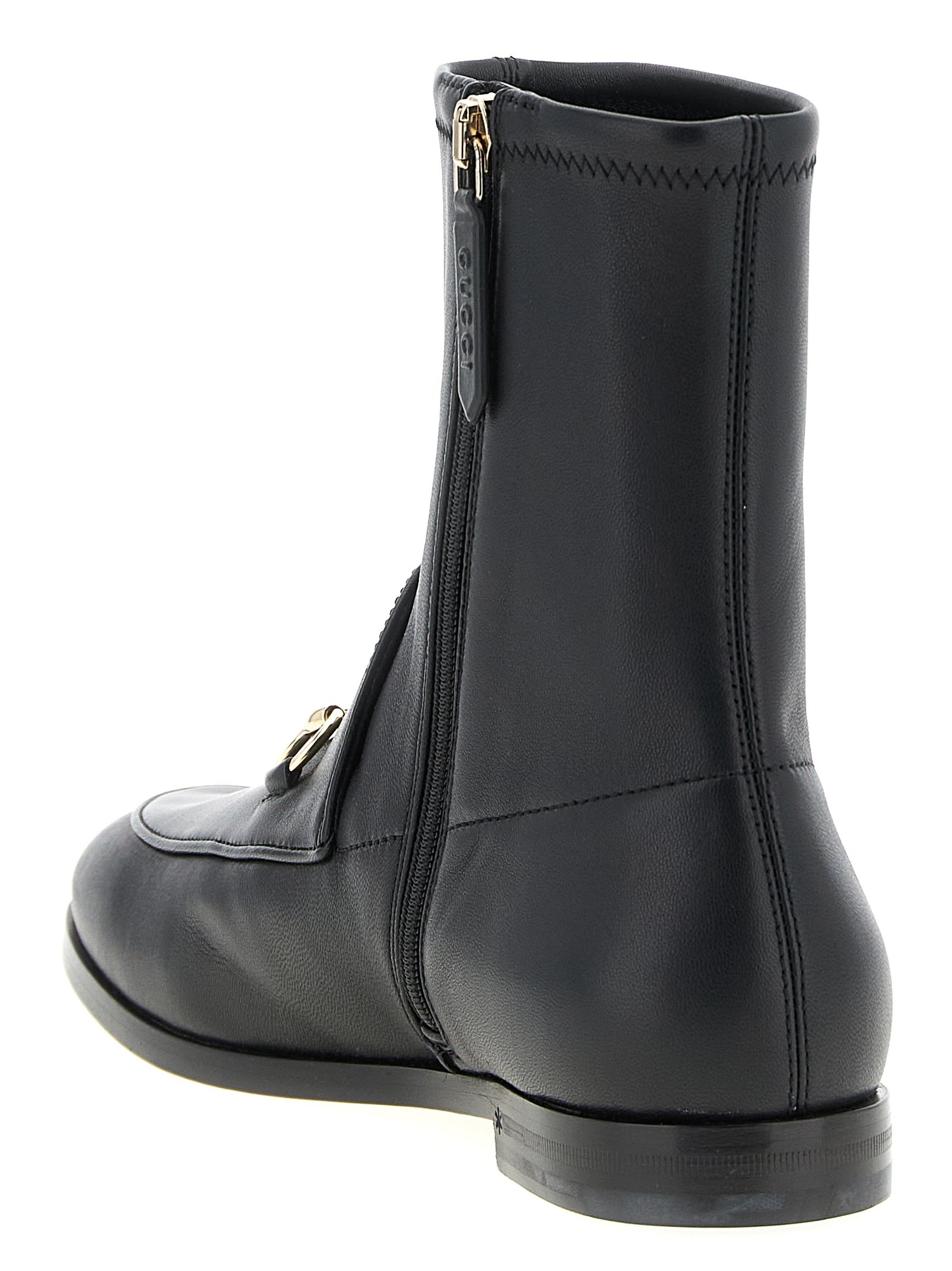 Ankle Boots by Gucci for women in lamb leather black showcases a impeccable silhouette as Women's Lamb Leather Ankle Boots, artfully defined by a impeccable and a impeccable .