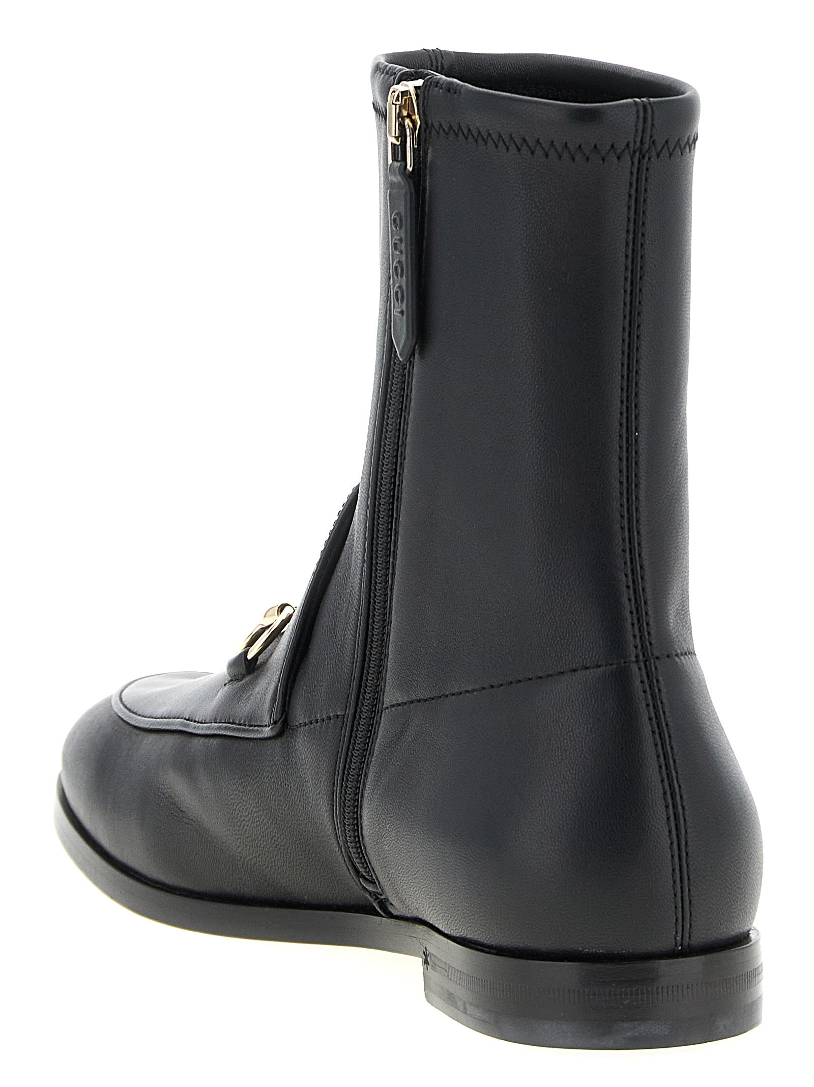Ankle Boots by Gucci for women in lamb leather black showcases a impeccable silhouette as Women's Lamb Leather Ankle Boots, artfully defined by a impeccable and a impeccable .