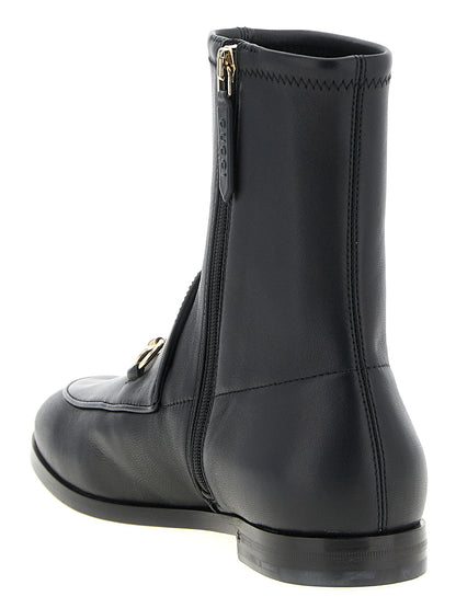 Ankle Boots by Gucci for women in lamb leather black showcases a impeccable silhouette as Women's Lamb Leather Ankle Boots, artfully defined by a impeccable and a impeccable .