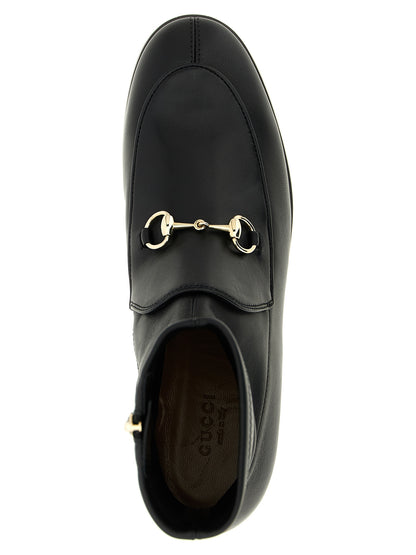 Ankle Boots by Gucci for women in lamb leather black features an high-performance silhouette, showcasing the sophisticated design of the Women's Lamb Leather Ankle Boots with a and a refined .