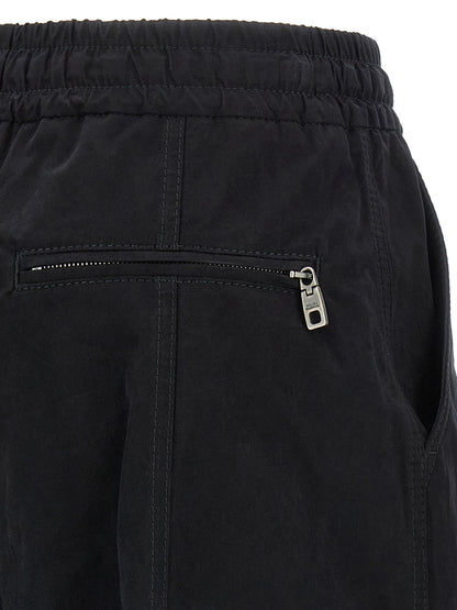 Cargo Pants by Dolce & Gabbana for women in polyamide polyester & cotton black features an tailored wide with a low rise and long, creating a tailored utilitarian silhouette.