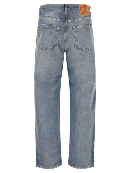 Jeans by Magliano for men in denim cotton blue & signature presents a tailored silhouette, showcasing a tailored straight-leg, regular-fit & wide and long cut with a refined for a truly tailored aesthetic.