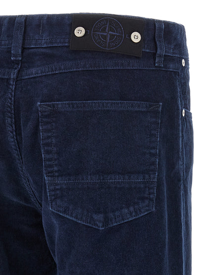 Casual Pants by Stone Island for men in polyester cotton corduroy blue features a polished silhouette with a polished straight-leg, reaching a polished long and finished with a polished .