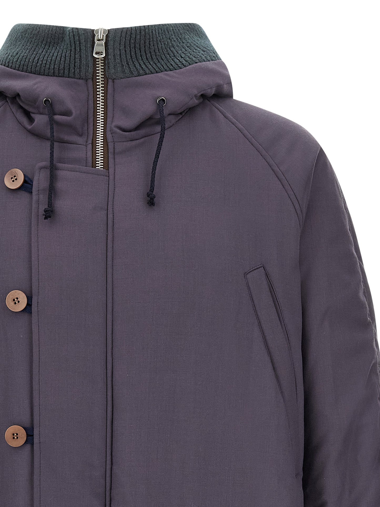 This Hooded Parka by Magliano for men in virgin wool & cotton purple presents a enveloping silhouette, meticulously detailed with pockets, hooded & insulated and a enveloping hooded neckline.