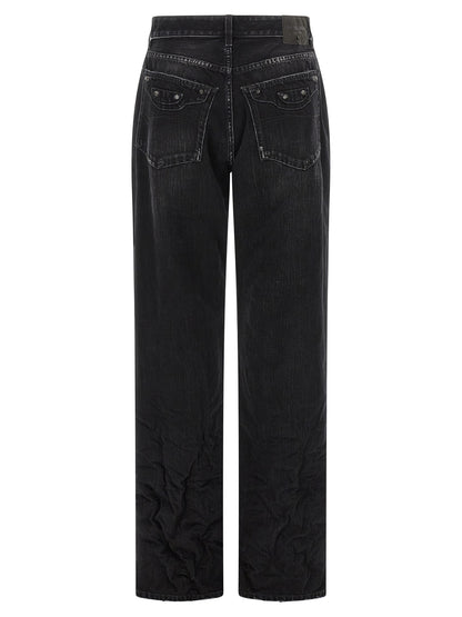Jeans by Balenciaga for women in denim cotton black presents a tailored silhouette, showcasing a tailored straight-leg and long cut with a refined mid rise for a truly tailored aesthetic.