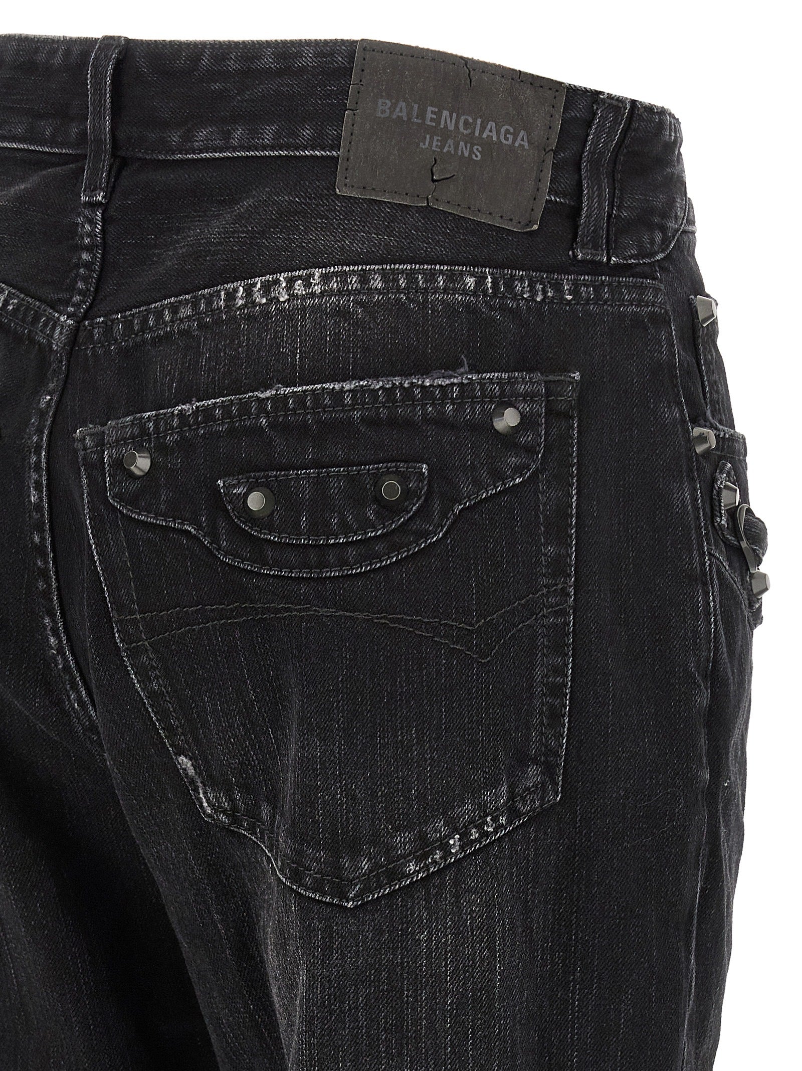 Jeans by Balenciaga for women in denim cotton black presents a refined pantology silhouette, artfully defined by a refined pantology straight-leg, long, and a sophisticated mid rise.